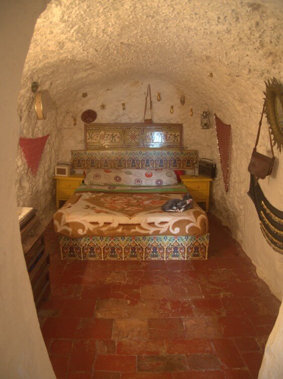 Bedroom in a cave-house. Comes with free cat!