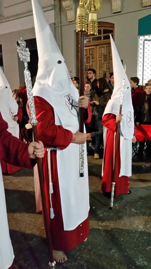 Some of the penitents march barefoot like this guy here.