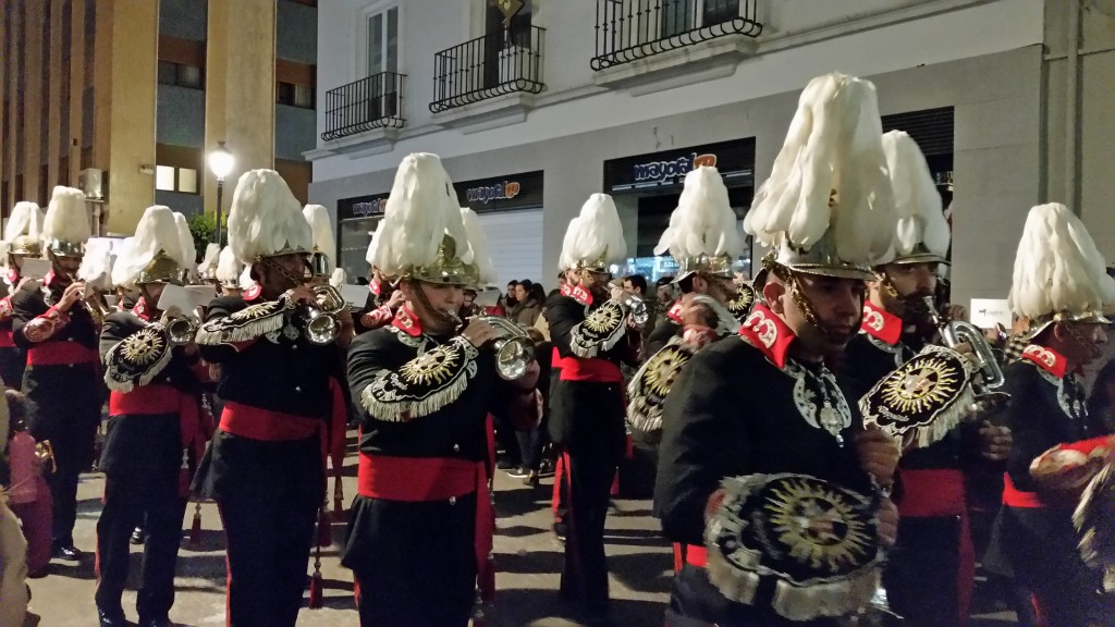 All of the holy images are followed by a marching band.