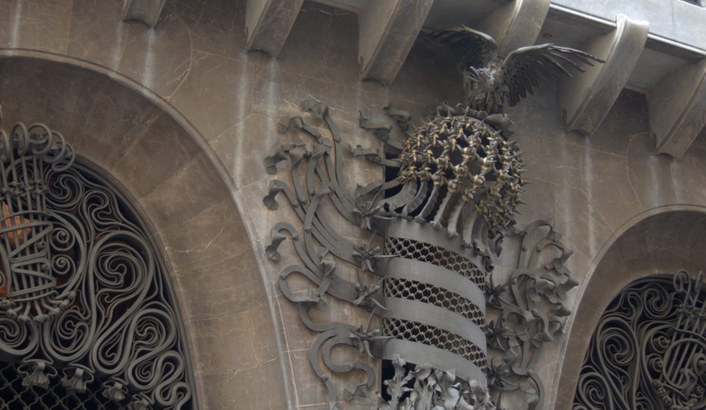 Wrought iron sculpture at the entrance to Palau Guell.