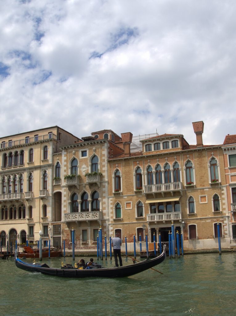 Stereotypical Venice; a gondola going past on the Grand Canal.