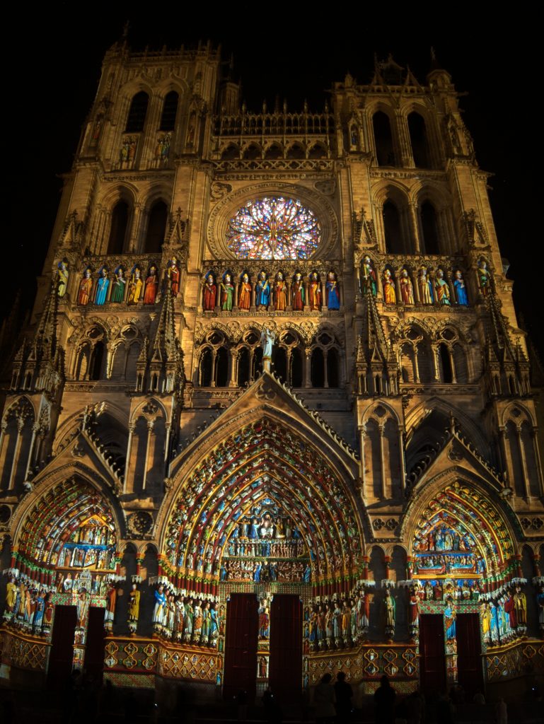 Amiens Cathedral lit up at night.