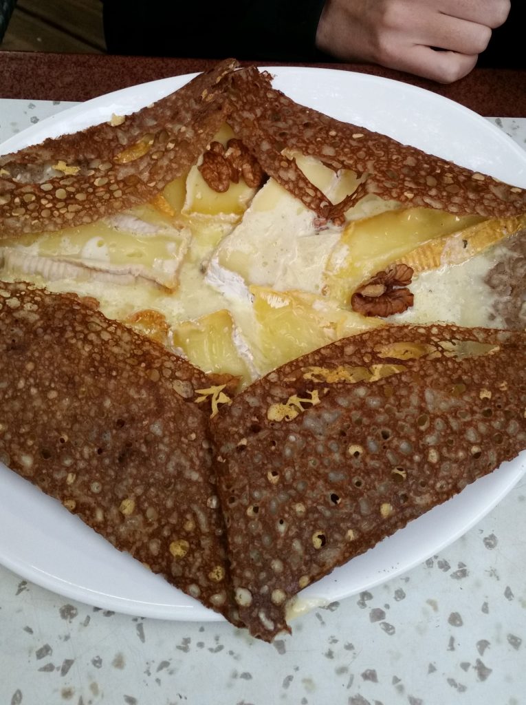 A typical dinner in Normandy; galette with 4 types of French cheese.