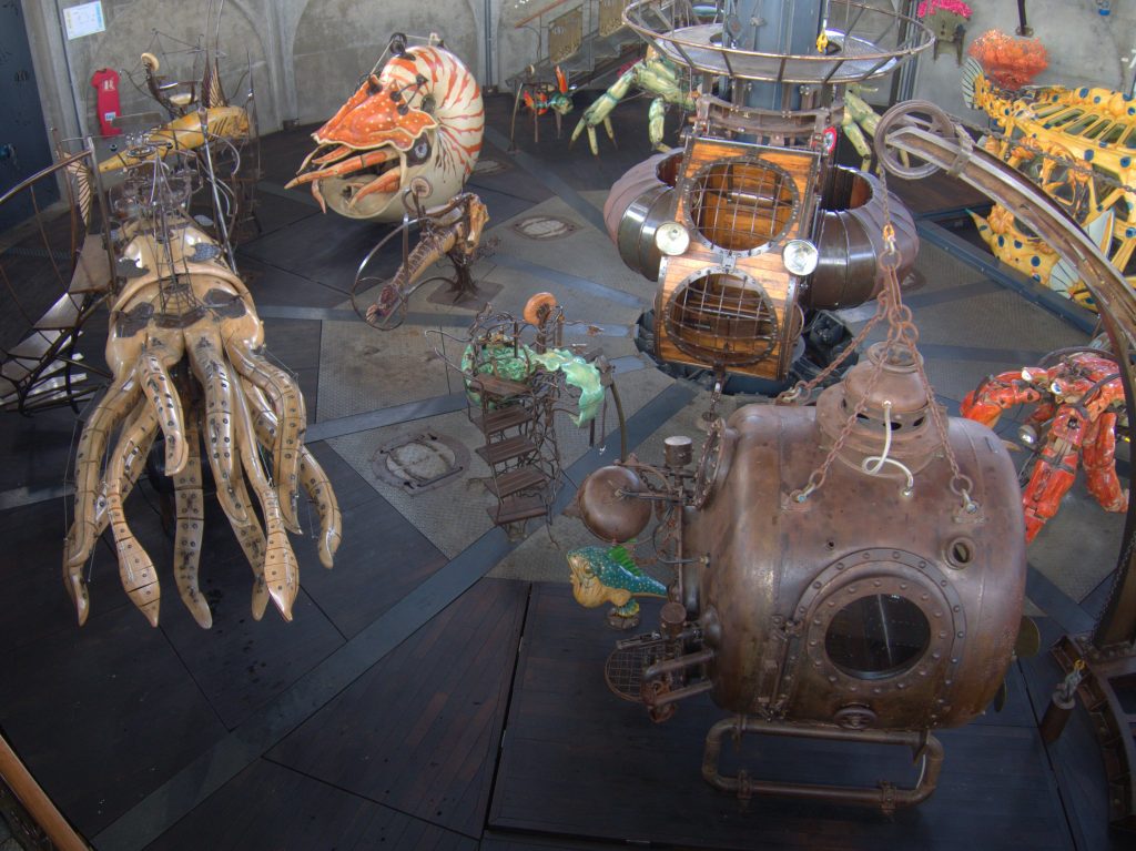 The lowest level of the merry-go-round, with creatures living on the bottom of the ocean. The giant squid and the submarine were in Jules Verne's book 'Twenty Thousand Leagues Under the Sea'.