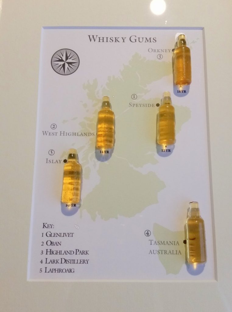 Whisky gums. Each one is made from a different whisky and you just peel off the gummy lollies from the map.