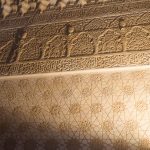 One of the many intricate carved walls in the Alhambra Palace in Granada.