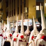 Penitents marching in the Semana Santa procession in Granada.