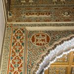 A close up of the intricately carved walls and ceilings in Seville's Alcázar.
