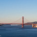 A picture of the view of the Golden Gate Bridge taken from a distance.