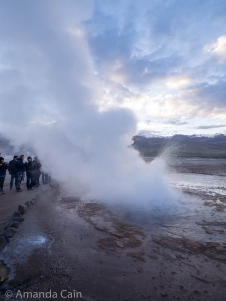Some of the geysers like this one shoot out frothy hot water spurts along with the steam.