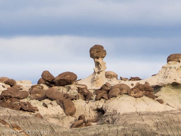 One stone still standing on its pillar, the others have all eroded away.