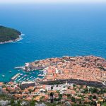 The red-roofed walled city of Dubrovnik in the sparkling blue Adriatic Sea.