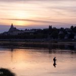 Fishing on the Loire River at sunset.