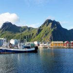 Svolvaer is a town of brightly coloured houses nestled at the bottom of some impressive mountains.