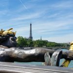A view over the Seine River from the Pont Alexandre III.