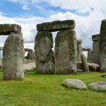 The standing stones of Stonehenge, set up so that they are aligned with the position of the sun during the solstices.