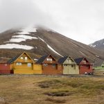 The town of Longyearbyen is full of colourful houses. They are one of the few sources of colour in the high Arctic, a land of white snow and black rocks.