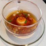 Mock turtle soup inspired by Alice in Wonderland. To make the broth for this you put a gold pocket watch into a teapot of hot water and then it dissolves, then you pour the tea into the teacup and you have soup!