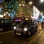 Christmas lights and London cabs on Oxford Street.