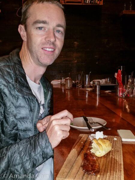 Here you can see that Pedr is being very good and enjoying a balanced meal of honey bacon, whipped butter and bread.