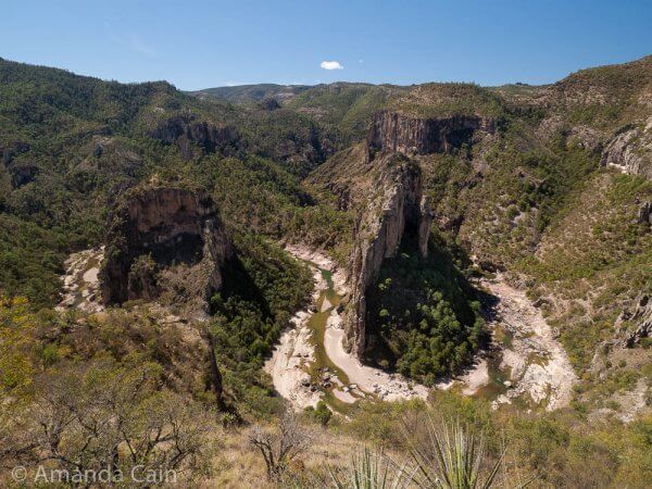 The Double Horseshoe. Two pillars of rock carved out by the Urique River flowing between them.