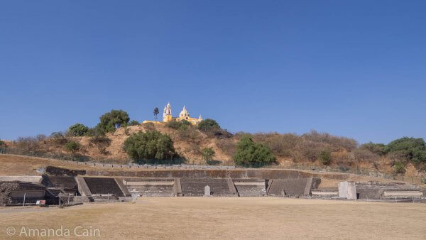 One of the reconstructed layers of the Cholula's Great Pyramid. The layer above it hasn't been restored, and on top you can see the church.