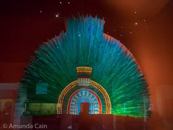 It's not the original (for some reason it's in Austria). But this is supposedly the feathered crown of Moctezuma II, the reigning Aztec emperor when the Spanish arrived.