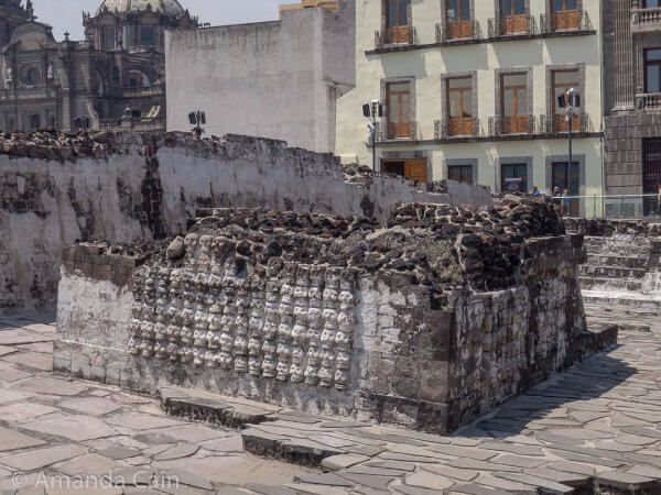 A shrine covered with walls of carved skulls.