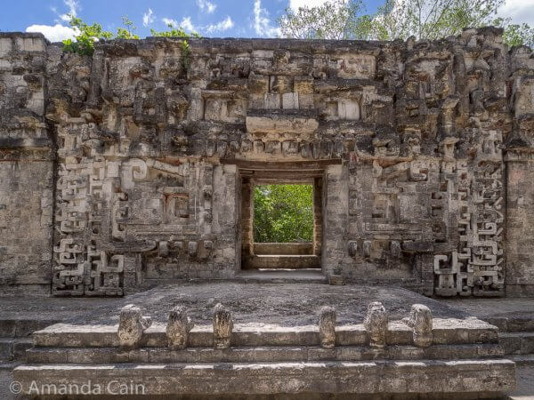 An entrance to a temple at Chicana. The decorations around the doorway are the mouth and head of a monster. (You can see the bottom teeth in the lower section of the photo at the top of the stairs.) By going inside the mouth of the monster, a priest was entering the Underworld.