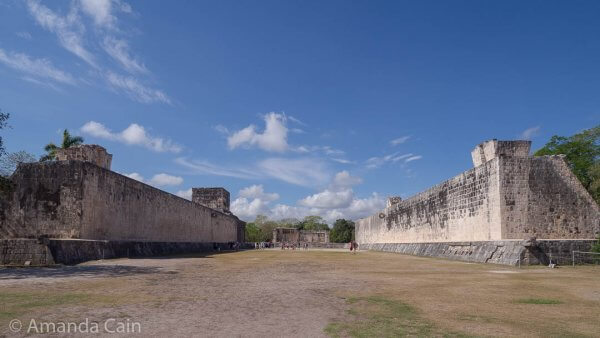 The Great Ball Court of Chichen Itza. At 168 metres by 70 metres, it's the largest of the Mesoamerican ball courts. If you look halfway along the the sides of the court, near the top you can see a (tiny) stone ring on each side. The players had to hit a 4kg rubber ball through this hole without using their hands.